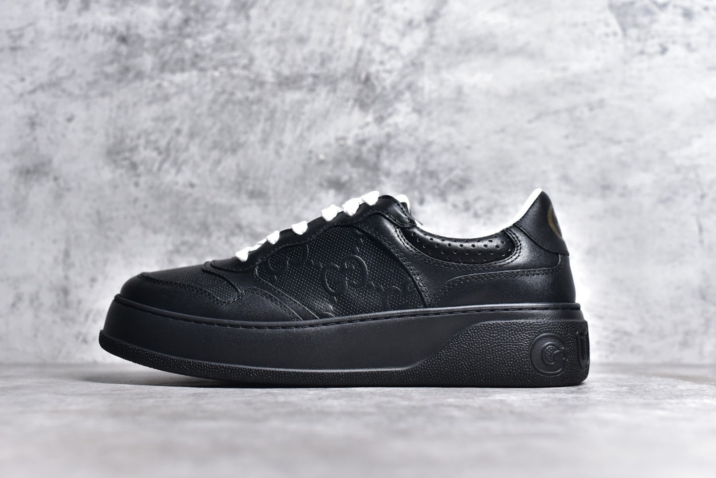 GG Embossed Black Leather