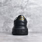 GG Embossed Black Leather