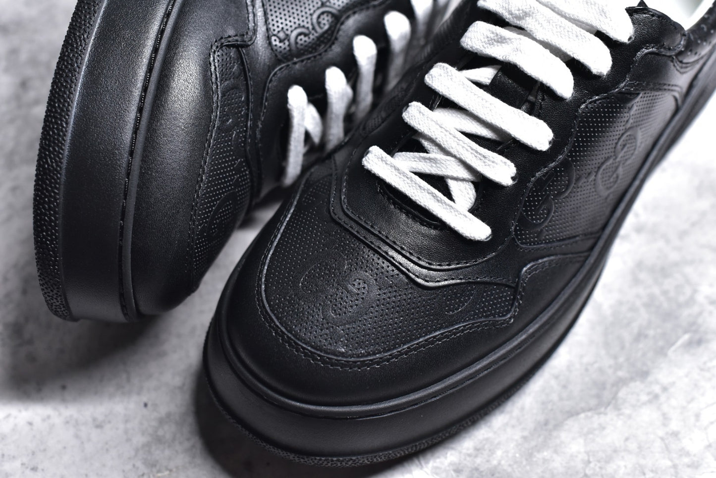 GG Embossed Black Leather