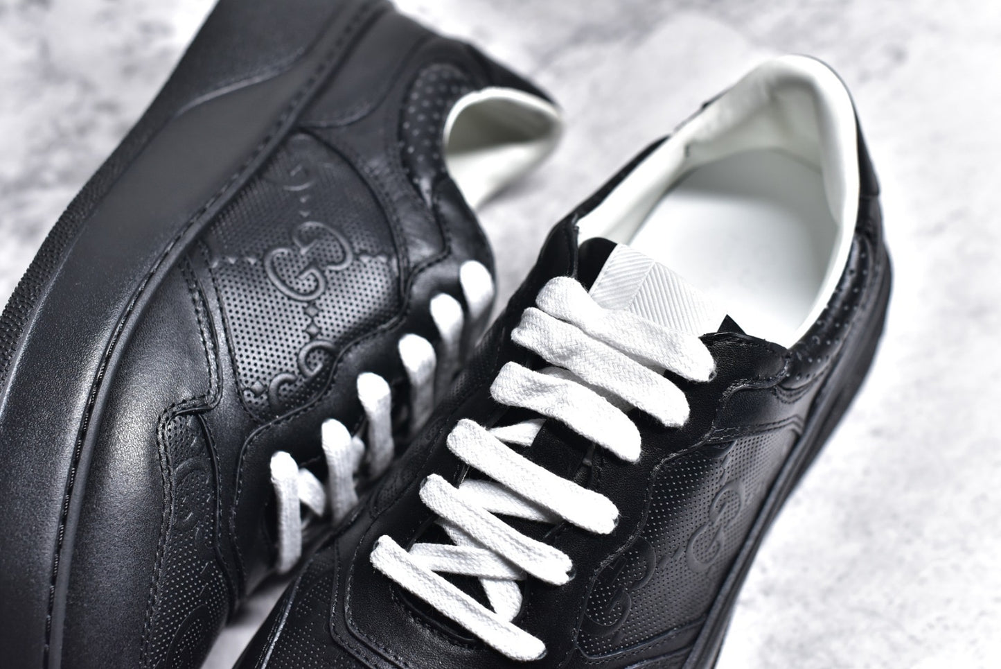 GG Embossed Black Leather