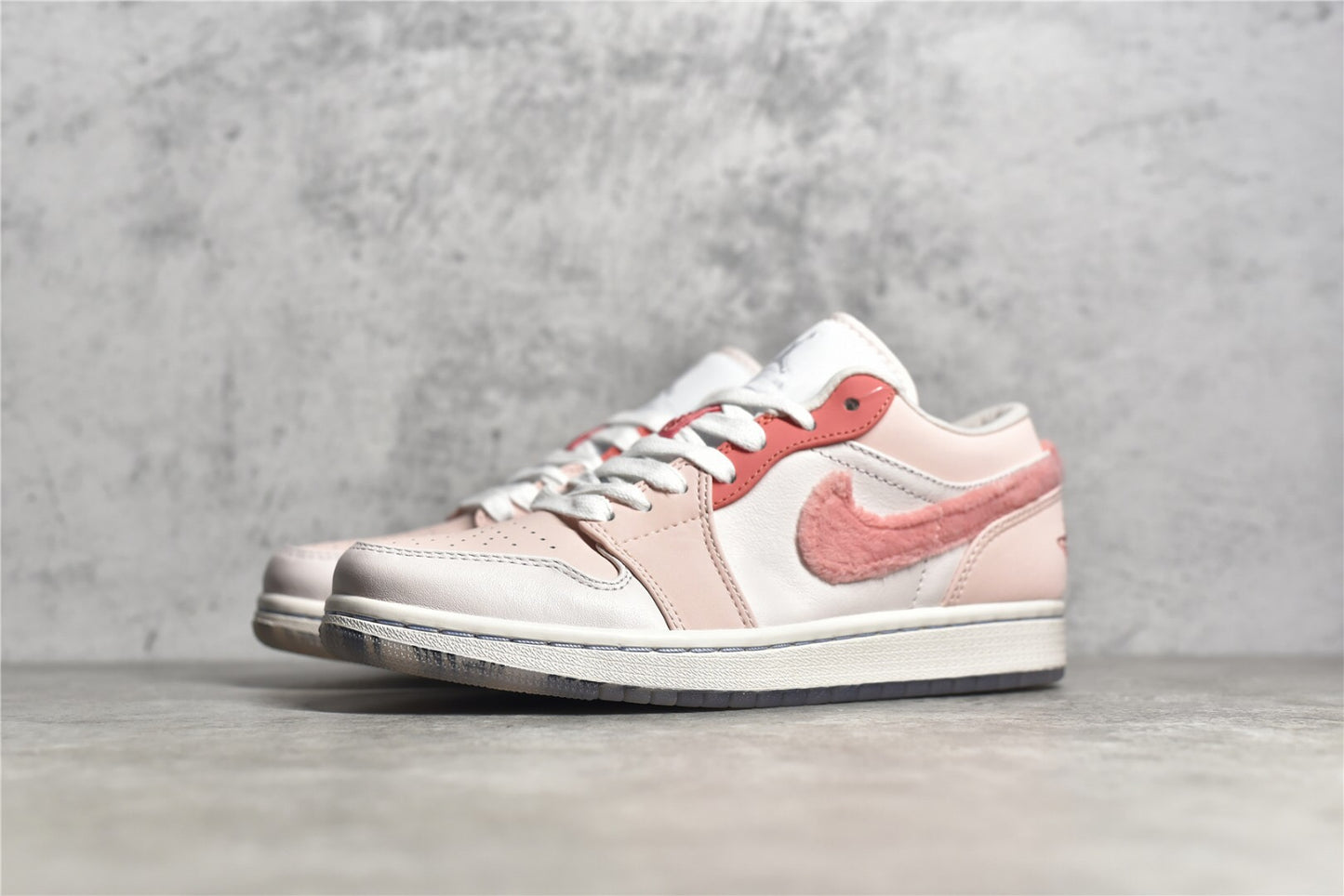 Jordan 1 Low SE Mighty Swooshers Pink