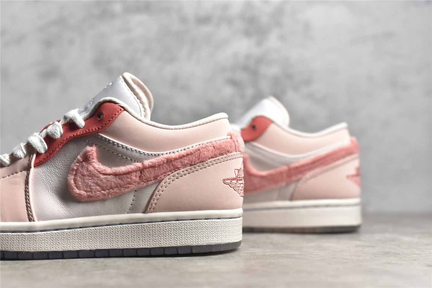 Jordan 1 Low SE Mighty Swooshers Pink